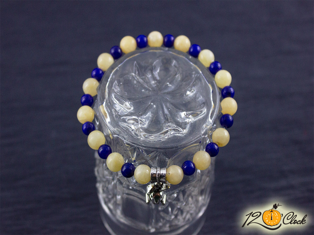 Гривна "Годината на Черния Воден Заек" – жълт жадеит и тъмно син ахат